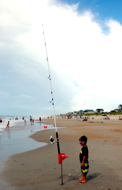 Charlie doing some serious fishing on the beach.