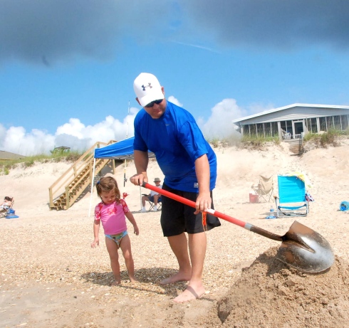 Jason spent a LOT of time digging holes on the beach!  The kids love it!