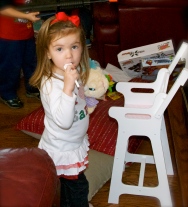 Maddie loved her new high chair from Gaga.