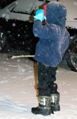 Charlie with his "snow stick." He loved drawing designs in the snow.